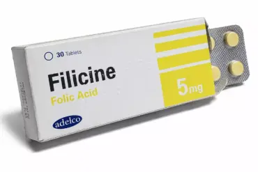Συσκευασία FILICINE 5 mg φυλλικού οξέος με εμφανές blister κίτρινων δισκίων.